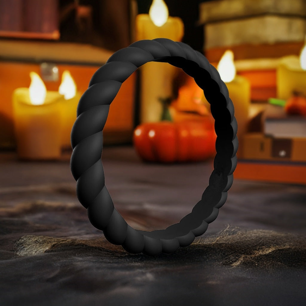 Black Women's Silicone Ring Next To Halloween Decorations